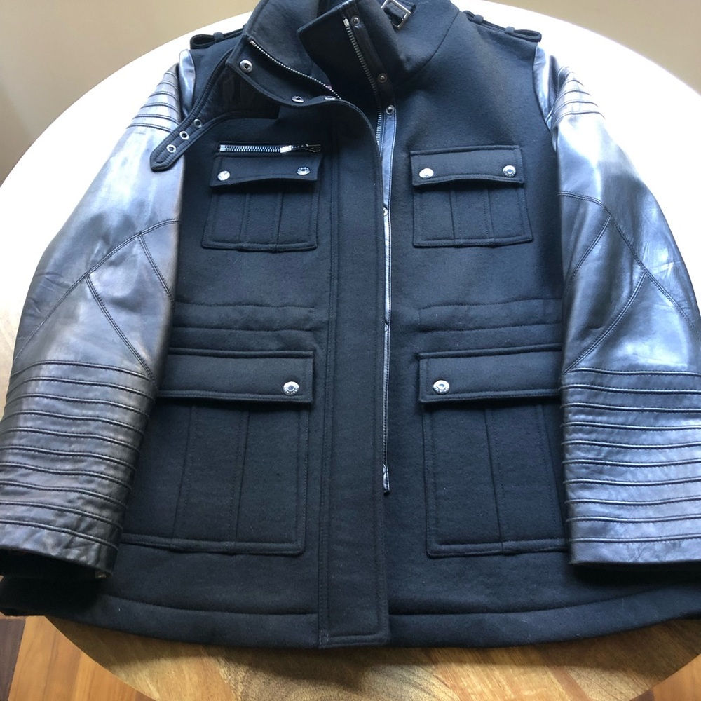 Fun jacket - purchased as Saks a few years ago. Great length for winter months.